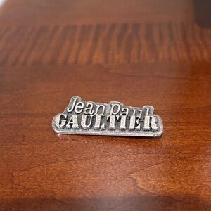 Jean Paul Gaultier Metallic Logo Pin